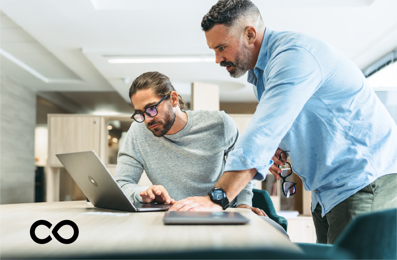 two business people discussing a contract